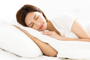 Young,Beautiful,Woman,Sleeping,In,The,Bed